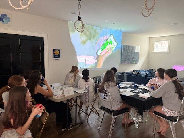 Students in a class about phone and online safety