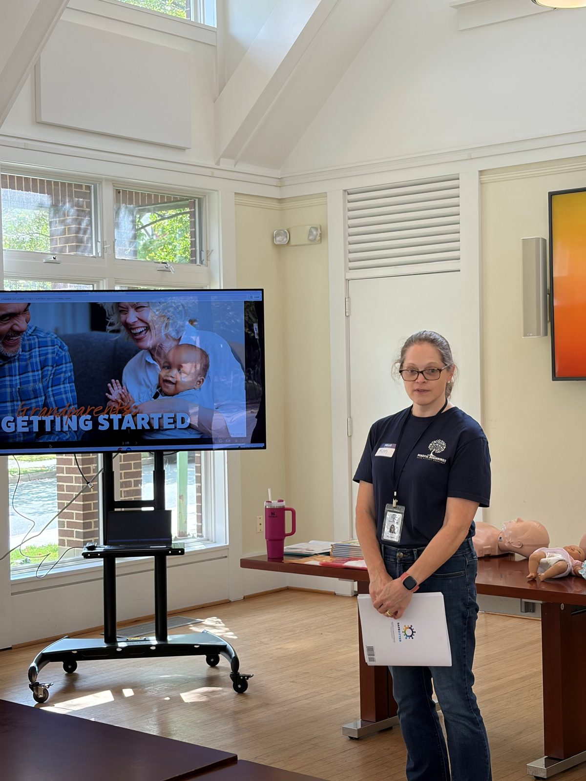 An instructor teaching a grandparents class